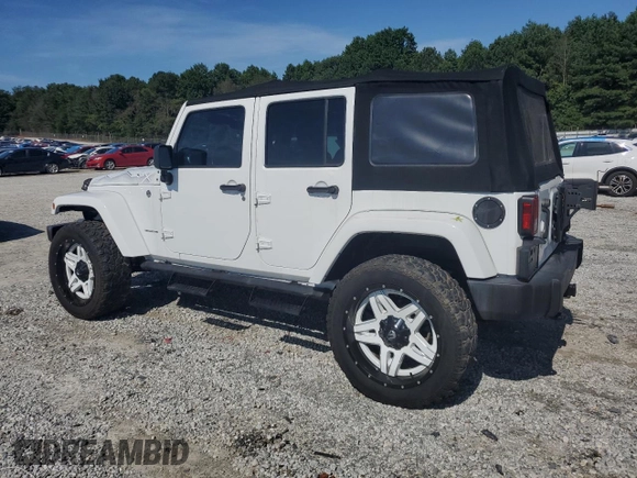 2015 Jeep Wrangler Unlimited Sahara with VIN 1C4BJWEG3FL584920, listed as a Copart auction lot 61843525 with 62,876 mi miles and Salvage title. Bid and sale history available at DreamBid. Image 2.