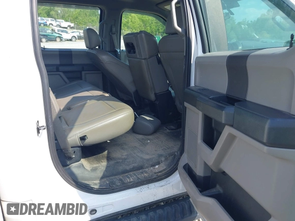 2019 Ford F-150 XL with VIN 1FTEW1CB3KKD58854, listed as a IAAI auction lot 42119966 with 91,198 mi miles and . Bid and sale history available at DreamBid. Image 8.