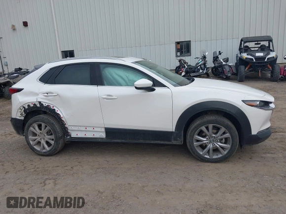 2021 Mazda CX-30 Premium with VIN 3MVDMBDM8MM216520, listed as a IAAI auction lot 41848596 with 60,353 mi miles and . Bid and sale history available at DreamBid. Image 13.
