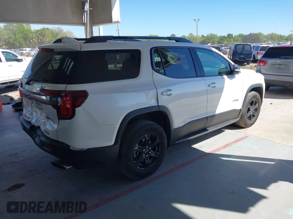 2021 GMC Acadia AT4 with VIN 1GKKNLLS0MZ102445, listed as a IAAI auction lot 41827776 with 105,336 mi miles. Bid and sale history available at carsss.com. Image 4.