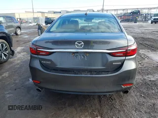 2020 Mazda 6 Grand Touring with VIN JM1GL1TY0L1521859, listed as a IAAI auction lot 41634368 with 36,709 mi miles and . Bid and sale history available at DreamBid. Image 16.