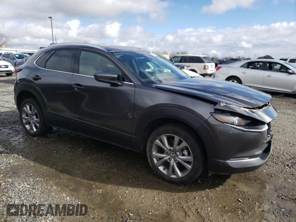 2021 Mazda CX-30 Premium with VIN 3MVDMBDM2MM233751, listed as a Copart auction lot 45361605 with 66,387 mi miles and Salvage Title. Bid and sale history available at DreamBid. Image 4.