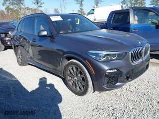 2019 BMW X5 xDrive50i with VIN 5UXJU2C56KLN66899, listed as a IAAI auction lot 41394997 with 30,158 mi miles. Bid and sale history available at carsss.com. Image 1.