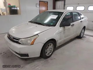 2009 Ford Focus SE with VIN 1FAHP35N59W180791, listed as a IAAI auction lot 42041573 with 201,464 mi miles. Bid and sale history available at carsss.com. Image 2.