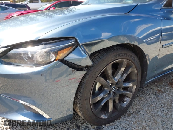 2016 Mazda Mazda6 i Grand Touring with VIN JM1GJ1W51G1436977, listed as a IAAI auction lot 42097363 with 128,941 mi miles. Bid and sale history available at carsss.com. Image 6.