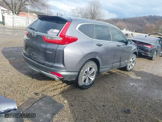 2019 Honda CR-V LX with VIN 5J6RW6H34KL005317, listed as a IAAI auction lot 41225711 with 59,166 mi miles. Bid and sale history available at carsss.com. Image 4.