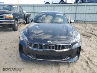 2021 Kia Stinger GT-Line with VIN KNAE15LA6M6088735, listed as a Copart auction lot 76973824 with 68,419 mi miles and Salvage Title. Bid and sale history available at carsss.com. Image 5.