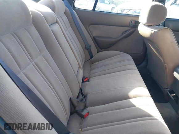 1994 Toyota Camry XLE with VIN JT2GK13E9R0025099, listed as a IAAI auction lot 41735273 with 281,833 mi miles. Bid and sale history available at carsss.com. Image 8.