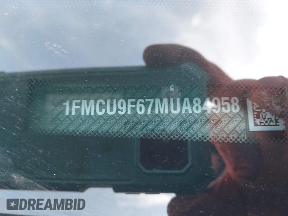 2021 Ford Escape S with VIN 1FMCU9F67MUA84958, listed as a IAAI auction lot 41512185 with 32,917 mi miles and . Bid and sale history available at DreamBid. Image 9.