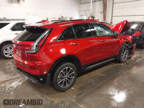 2024 Cadillac XT4 AWD Sport z VIN 1GYFZFR42RF154352, wystawiony jako IAAI lot #41249916 z przebiegiem 27 378 mil mil oraz . Historia ofert i sprzedaży dostępna na DreamBid. Obrazek 4.