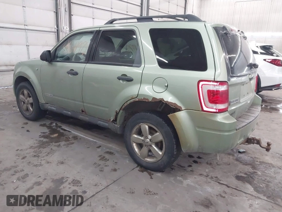 2008 Ford Escape XLT with VIN 1FMCU931X8KE68551, listed as a IAAI auction lot 41611972 with 267,034 mi miles. Bid and sale history available at carsss.com. Image 3.