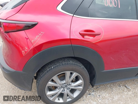 2023 Mazda CX-30 S Premium with VIN 3MVDMBDM3PM511402, listed as a IAAI auction lot 42180001 with 6,189 mi miles and . Bid and sale history available at DreamBid. Image 18.