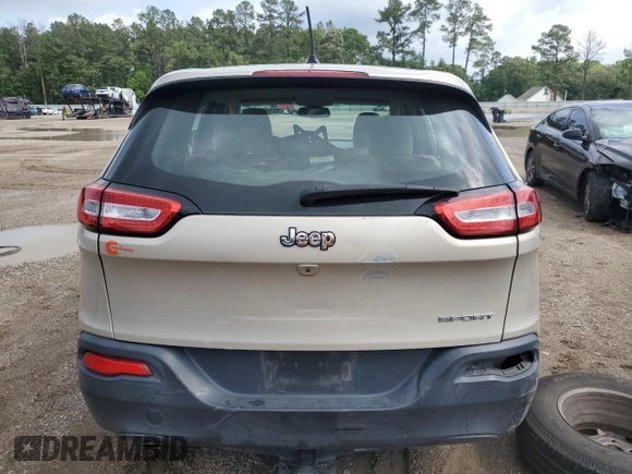 2015 Jeep Cherokee Sport z VIN 1C4PJLAB9FW547402, wystawiony jako Copart lot #53164885 z przebiegiem 128 717 mil mil oraz Szkoda całkowita • Salvage title. Historia ofert i sprzedaży dostępna na DreamBid. Obrazek 6.