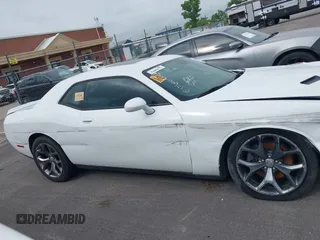 2015 Dodge Challenger SXT Plus with VIN 2C3CDZBG8FH906356, listed as a IAAI auction lot 42396865 with 184,565 mi miles and . Bid and sale history available at DreamBid. Image 13.