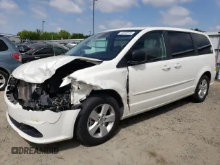 2013 Dodge Grand Caravan SE with VIN 2C4RDGBG3DR560962, listed as a Copart auction lot 53690225 with 124,796 mi miles and Salvage Title. Bid and sale history available at DreamBid. Image 1.