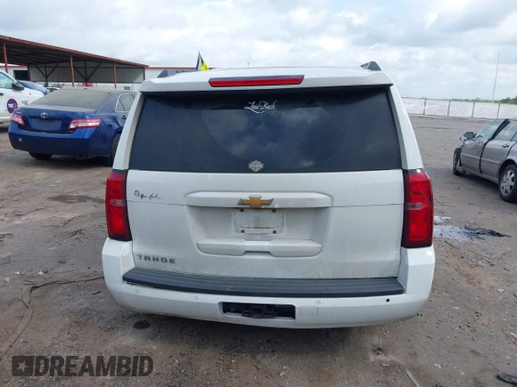 2017 Chevrolet Tahoe LS with VIN 1GNSCAKC5HR312729, listed as a IAAI auction lot 41928484 with 206,999 mi miles and . Bid and sale history available at DreamBid. Image 16.