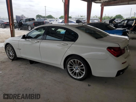 2013 BMW 7 Series 740i with VIN WBAYA6C5XDD143639, listed as a Copart auction lot 62296694 with 97,082 mi miles and Salvage Title. Bid and sale history available at carsss.com. Image 2.