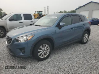 2016 Mazda CX-5 Touring z VIN JM3KE4CY6G0875345, wystawiony jako Copart lot #58993455 z przebiegiem 128 024 mil mil oraz Szkoda całkowita • Salvage title. Historia ofert i sprzedaży dostępna na DreamBid. Obrazek 1.