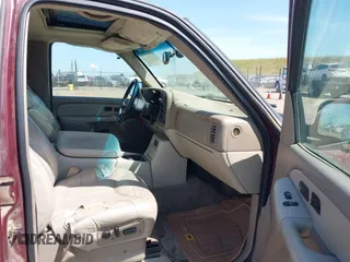 2001 GMC Yukon SLT with VIN 1GKEK13V81J100005, listed as a IAAI auction lot 42090494 with 276,042 mi miles. Bid and sale history available at carsss.com. Image 5.