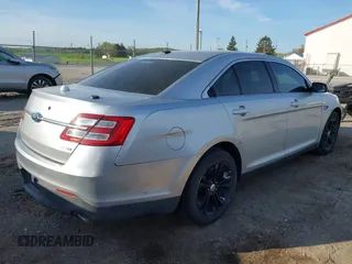 2013 Ford Taurus SEL with VIN 1FAHP2H88DG171375, listed as a IAAI auction lot 42110345 with 169,000 mi miles and . Bid and sale history available at DreamBid. Image 4.