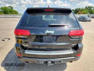 2014 Jeep Grand Cherokee Limited with VIN 1C4RJFBG9EC121990, listed as a Copart auction lot 64079495 with 98,615 mi miles and Salvage title. Bid and sale history available at DreamBid. Image 6.