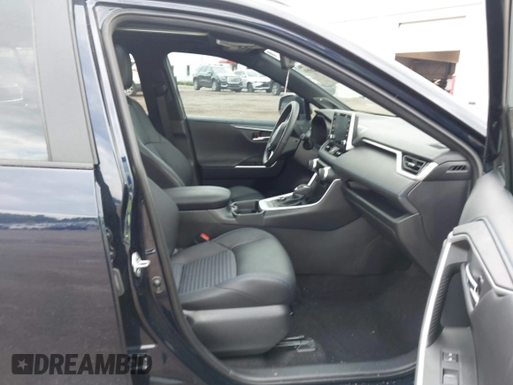 2021 Toyota RAV4 Hybrid XSE with VIN 4T3E6RFV0MU053245, listed as a IAAI auction lot 42426959 with 28,717 mi miles and . Bid and sale history available at DreamBid. Image 5.