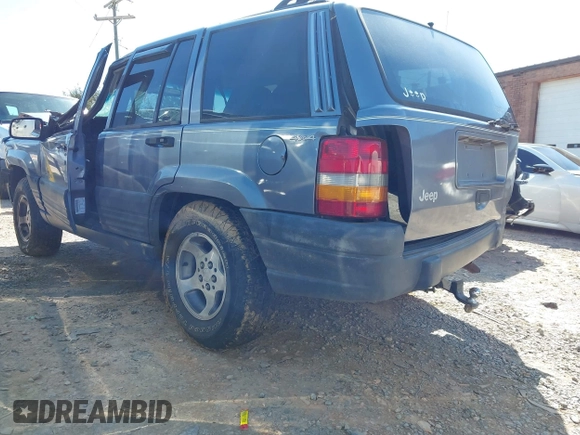 1996 Jeep Grand Cherokee Laredo with VIN 1J4GZ58S1TC168797, listed as a IAAI auction lot 41983746 with 1 mi miles. Bid and sale history available at carsss.com. Image 3.