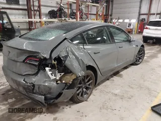 2018 Tesla Model 3 Long Range Battery with VIN 5YJ3E1EB8JF113566, listed as a IAAI auction lot 41726484 with 91,255 mi miles and . Bid and sale history available at DreamBid. Image 4.