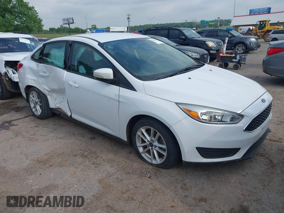 2015 Ford Focus SE with VIN 1FADP3F22FL376042, listed as a IAAI auction lot 42283236 with 76,675 mi miles and . Bid and sale history available at DreamBid. Image 1.