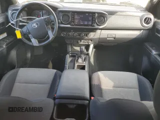 2020 Toyota Tacoma SR5 with VIN 3TMCZ5AN5LM338926, listed as a Copart auction lot 55236145 with 67,409 mi miles and Salvage title. Bid and sale history available at DreamBid. Image 8.
