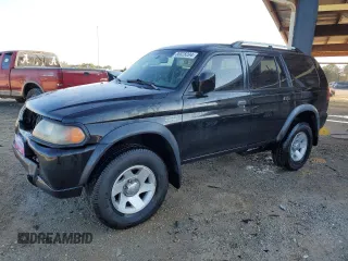 2004 Mitsubishi Montero z VIN JA4LS21R94J006129, wystawiony jako Copart lot #86828204 z przebiegiem 209 105 mil mil oraz Szkoda całkowita • Salvage title. Historia ofert i sprzedaży dostępna na DreamBid. Obrazek 1.