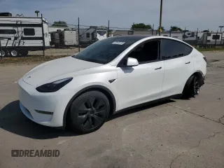 2024 Tesla Model Y Long Range z VIN 7SAYGDEE1RF152168, wystawiony jako Copart lot #52436135 z przebiegiem 3 546 mil mil oraz Szkoda całkowita • Salvage title. Historia ofert i sprzedaży dostępna na DreamBid. Obrazek 1.