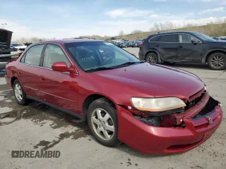 2000 Honda Accord SE with VIN JHMCG5677YC016067, listed as a Copart auction lot 54243735 with 155,183 mi miles and Salvage title. Bid and sale history available at DreamBid. Image 4.