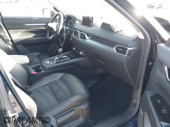 2019 Mazda CX-5 Touring with VIN JM3KFACM7K1534905, listed as a IAAI auction lot 41945607 with 56,014 mi miles. Bid and sale history available at carsss.com. Image 5.