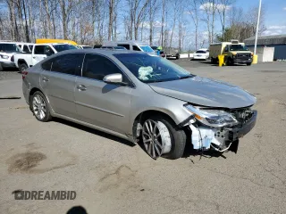 2014 Toyota Avalon Limited with VIN 4T1BK1EB4EU080093, listed as a Copart auction lot 54106595 with 108,995 mi miles and Salvage Title. Bid and sale history available at DreamBid. Image 4.