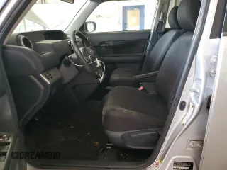 2009 Scion xB with VIN JTLKE50E091093553, listed as a Copart auction lot 53696735 with 173,124 mi miles and Salvage Title. Bid and sale history available at DreamBid. Image 7.