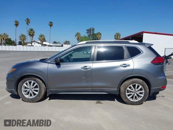 2017 Nissan Rogue SV with VIN KNMAT2MT9HP581822, listed as a IAAI auction lot 42140794 with 74,261 mi miles. Bid and sale history available at carsss.com. Image 14.