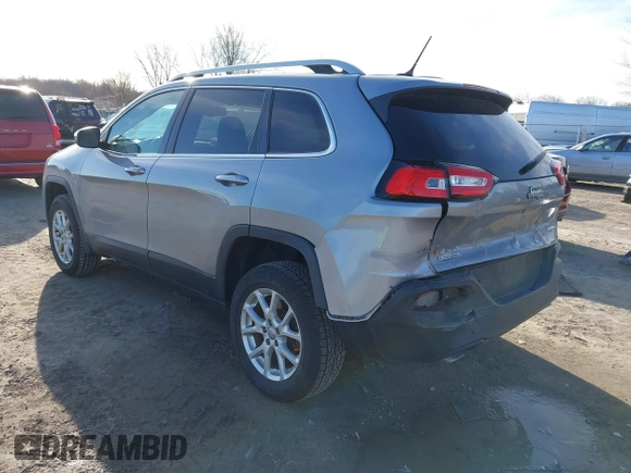 2014 Jeep Cherokee Latitude with VIN 1C4PJMCSXEW125737, listed as a IAAI auction lot 41863778 with 120,226 mi miles. Bid and sale history available at carsss.com. Image 3.