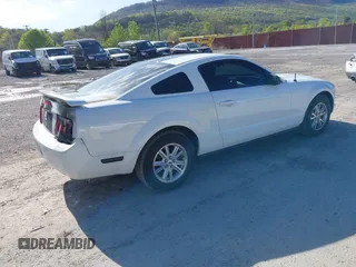 2006 Ford Mustang Standard with VIN 1ZVFT80N465121747, listed as a IAAI auction lot 42124022 with 129,026 mi miles. Bid and sale history available at carsss.com. Image 4.
