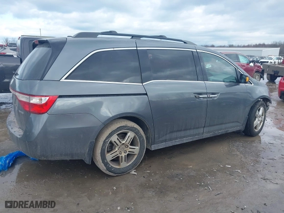 2011 Honda Odyssey Touring with VIN 5FNRL5H95BB007514, listed as a IAAI auction lot 41402516 with 281,032 mi miles. Bid and sale history available at carsss.com. Image 14.