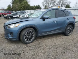 2016 Mazda CX-5 Grand Touring with VIN JM3KE4DY5G0761156, listed as a Copart auction lot 51665765 with 186,435 mi miles and Salvage Title. Bid and sale history available at carsss.com. Image 1.