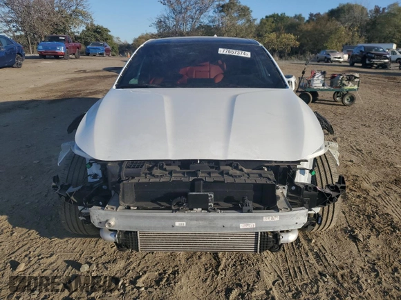 2023 Genesis G70 2.0T with VIN KMTG34TA1PU134120, listed as a Copart auction lot 77657374 with 12,024 mi miles and Salvage Title. Bid and sale history available at DreamBid. Image 5.