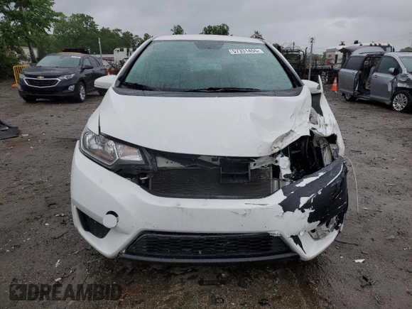 2015 Honda Fit LX with VIN 3HGGK5H57FM722000, listed as a Copart auction lot 57331455 with 140,546 mi miles and Salvage title. Bid and sale history available at DreamBid. Image 5.