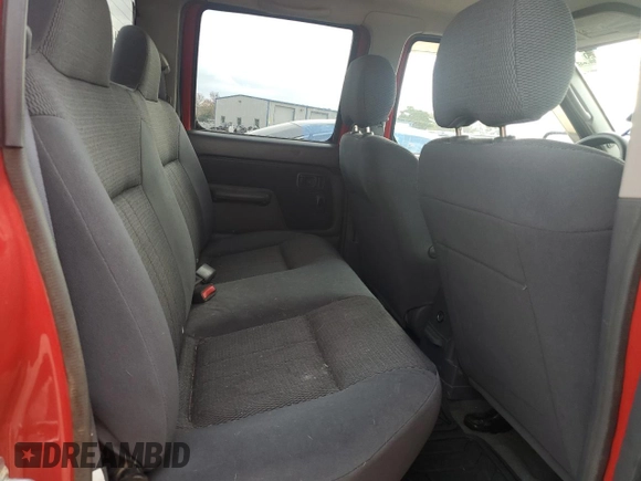 2004 Nissan Frontier SVE with VIN 1N6MD27Y44C459112, listed as a Copart auction lot 81287854 with 99,574 mi miles and Salvage title. Bid and sale history available at DreamBid. Image 10.