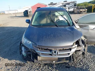 2014 Honda CR-V EX z VIN 5J6RM4H5XEL040749, wystawiony jako IAAI lot #42099244 z przebiegiem 106 887 mil mil oraz . Historia ofert i sprzedaży dostępna na DreamBid. Obrazek 13.