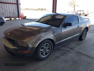 2005 Ford Mustang Deluxe with VIN 1ZVFT80N155128766, listed as a IAAI auction lot 41667434 with 233,175 mi miles. Bid and sale history available at carsss.com. Image 2.