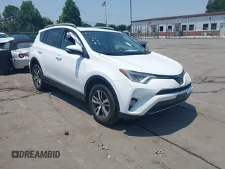 2018 Toyota RAV4 XLE with VIN 2T3WFREV1JW459553, listed as a IAAI auction lot 42423474 with 129,523 mi miles and . Bid and sale history available at DreamBid. Image 1.