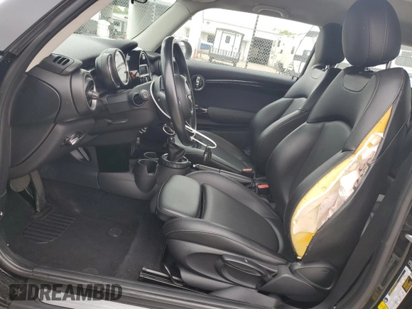 2014 MINI Hardtop S with VIN WMWXM7C57ET987069, listed as a Copart auction lot 52147955 with 121,276 mi miles and Salvage Title. Bid and sale history available at DreamBid. Image 7.