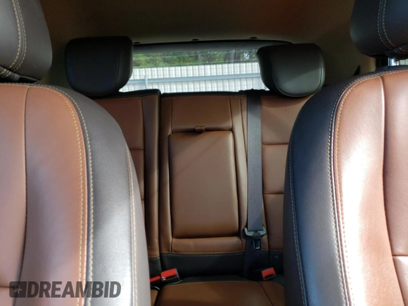 2016 Buick Encore Leather with VIN KL4CJCSB1GB553243, listed as a Copart auction lot 83396594 with 122,530 mi miles and Salvage Title. Bid and sale history available at DreamBid. Image 10.