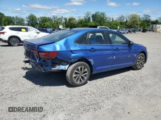 2023 Volkswagen Jetta S with VIN 3VW5M7BU6PM042471, listed as a Copart auction lot 56950155 with 7,043 mi miles and Salvage title. Bid and sale history available at DreamBid. Image 3.